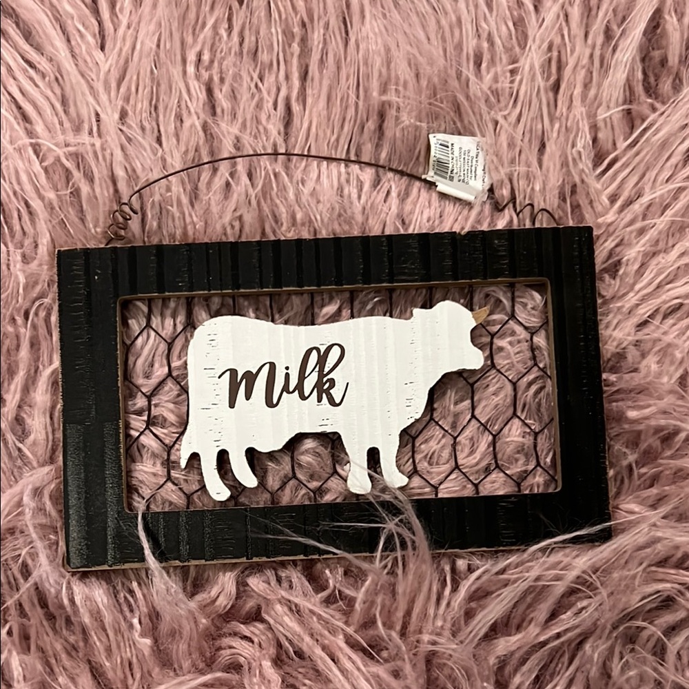 Black and White Cow Milk Sign